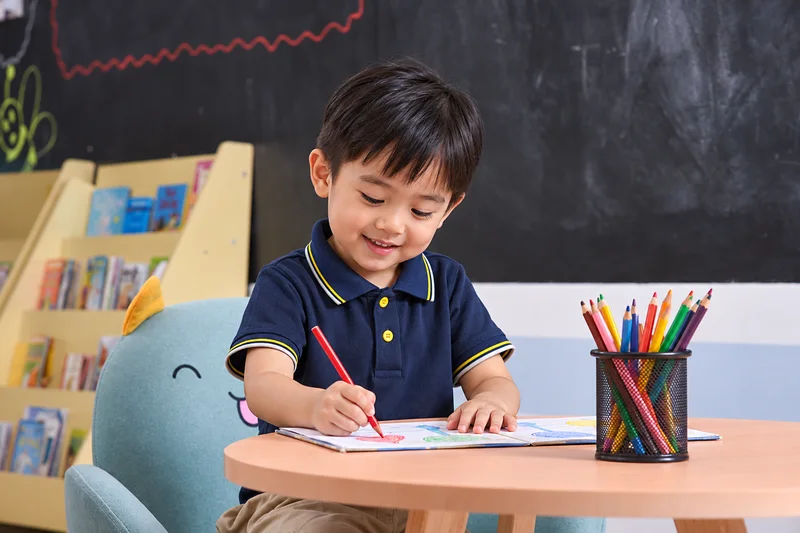 A child in a navy uniform drawing with coloured pencils — AI-generated illustration