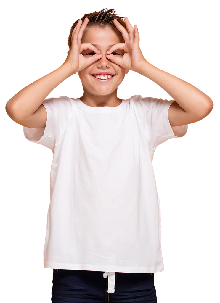 Child making glasses with their hands and smiling